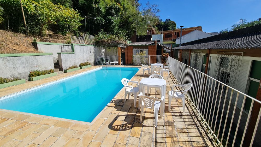 Casa 4q 2 Suítes piscina área de lazer 4 vagas cobertas (6) Locação Casa - Rua Rui Barbosa 140 ValençaCasa 4q 2 Suítes piscina área de lazer 4 vagas cobertas (6)